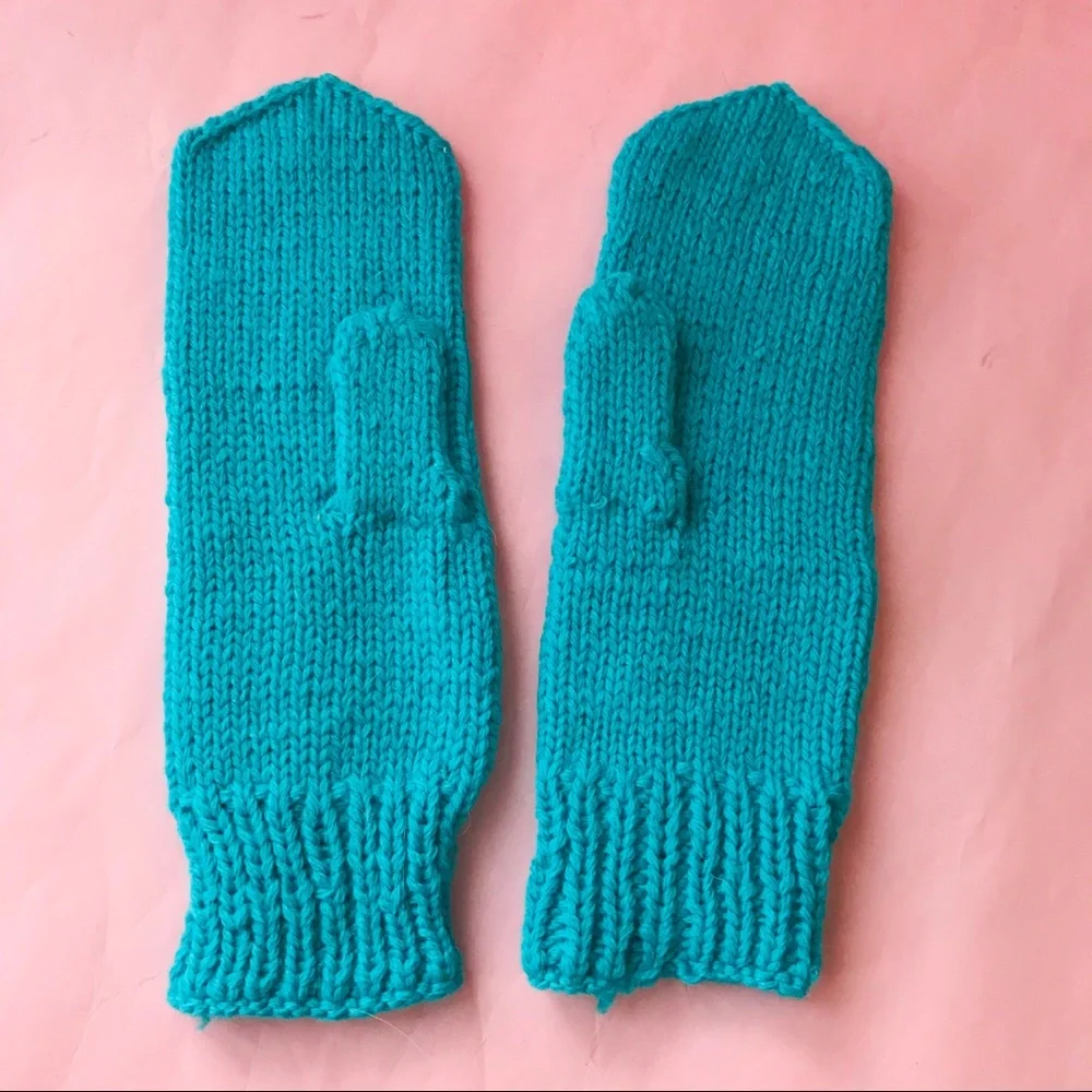 New turquoise hand knitted wool mittens